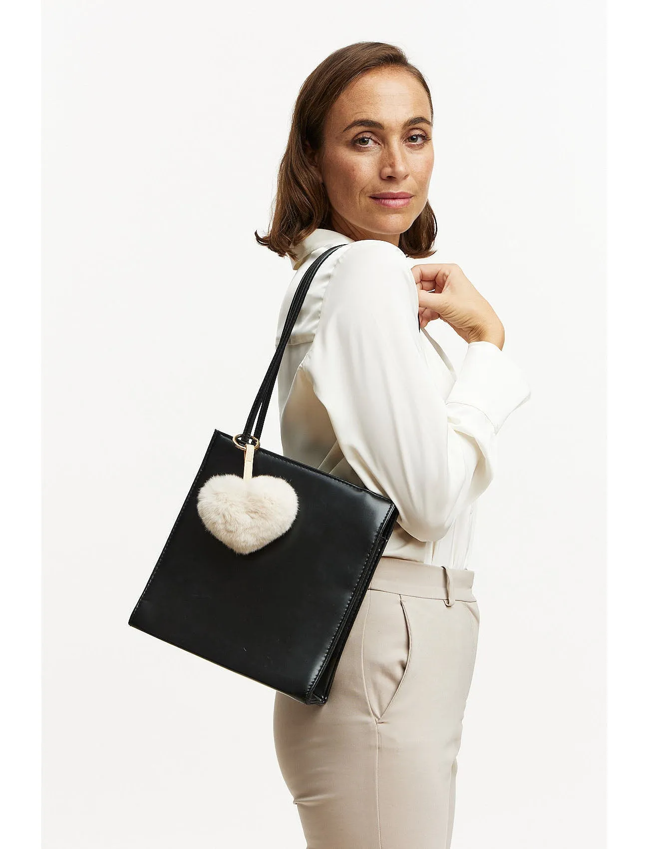 Bagcharm made of fur in the shape of a heart - beige
