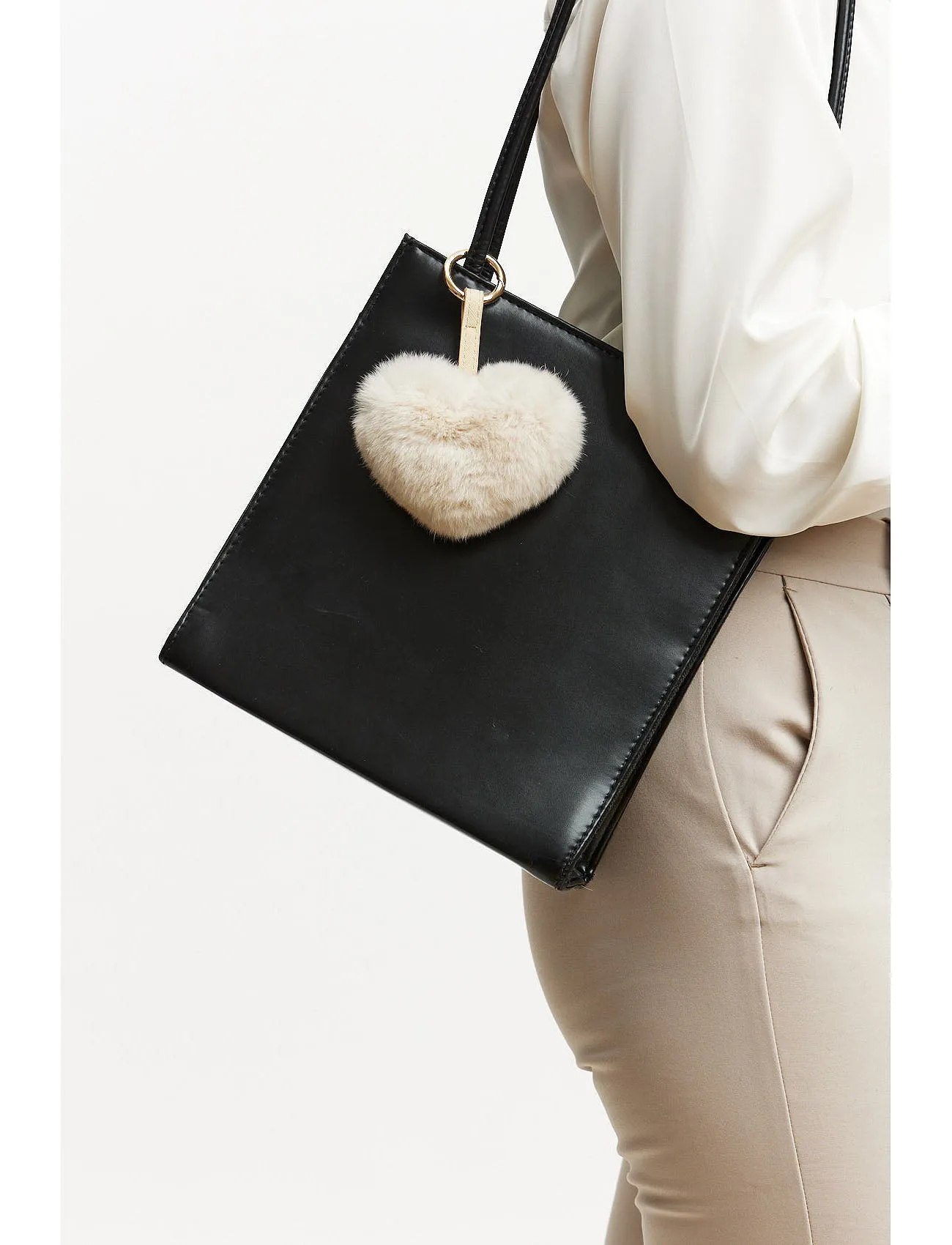 Bagcharm made of fur in the shape of a heart - beige